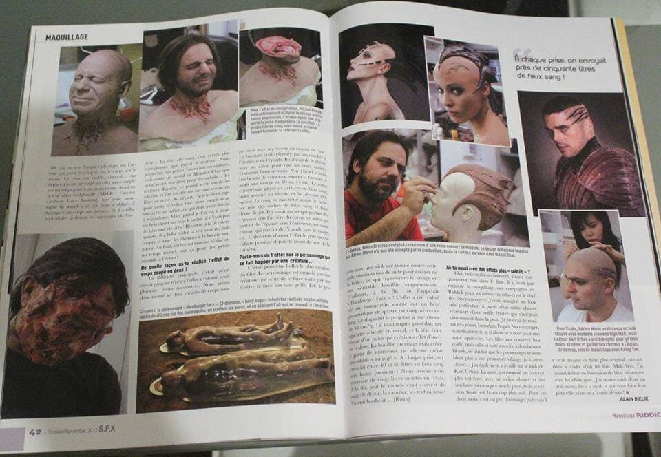 Magazine feature on the Noah creature work, open on the bench