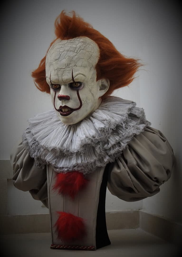 Pennywise bust in full costume on a stand